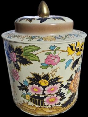 Vintage Riley's Toffee tin featuring a floral pattern